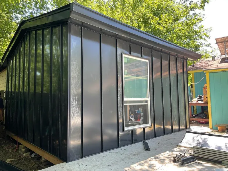 Black standing seam metal wall panels for Roof Inspection in Miami